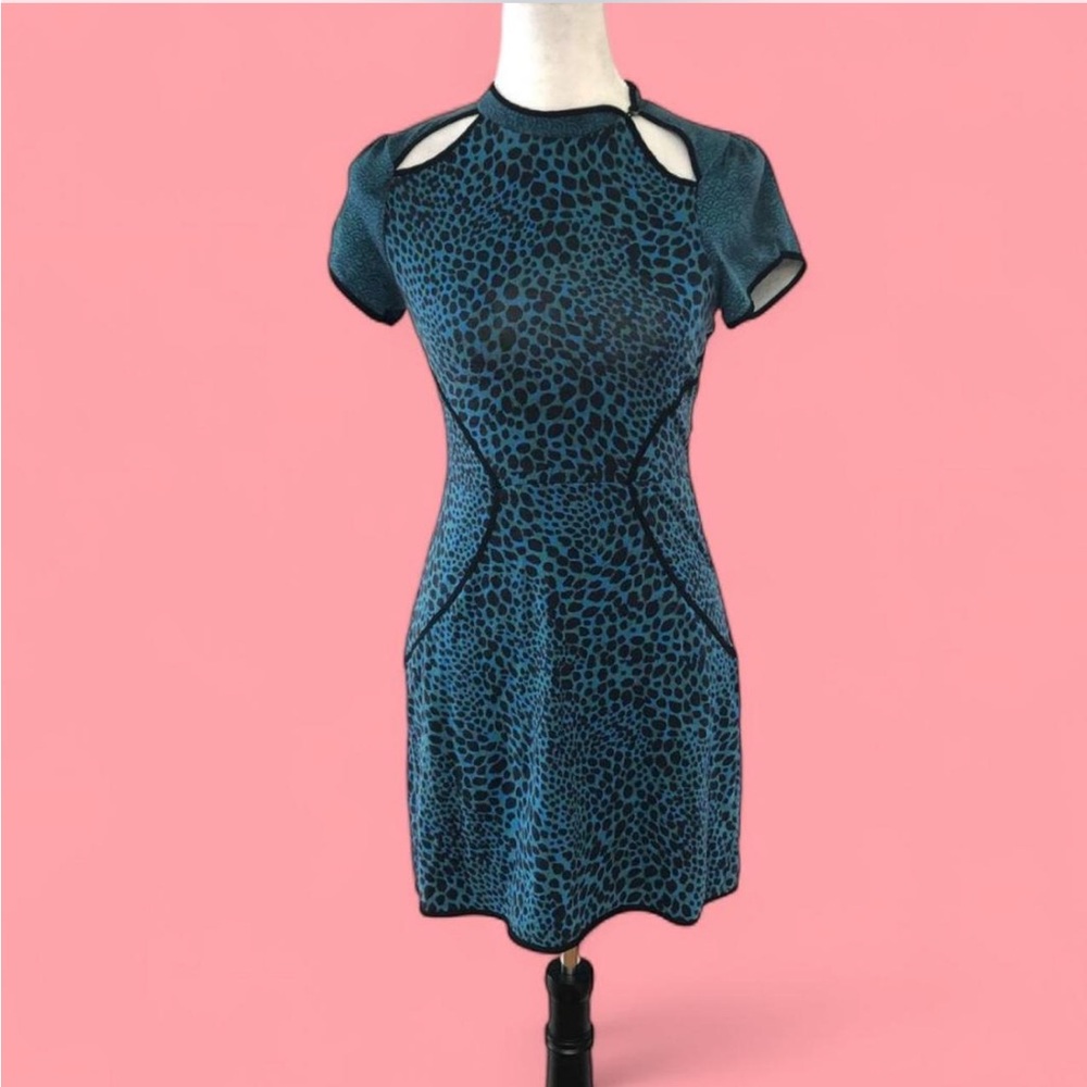 Silence + Noise mini teal leopard print dress with cut outs.